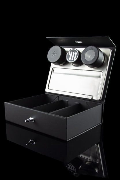 Black cannabis storage box with open tray and two airtight jars inside.
