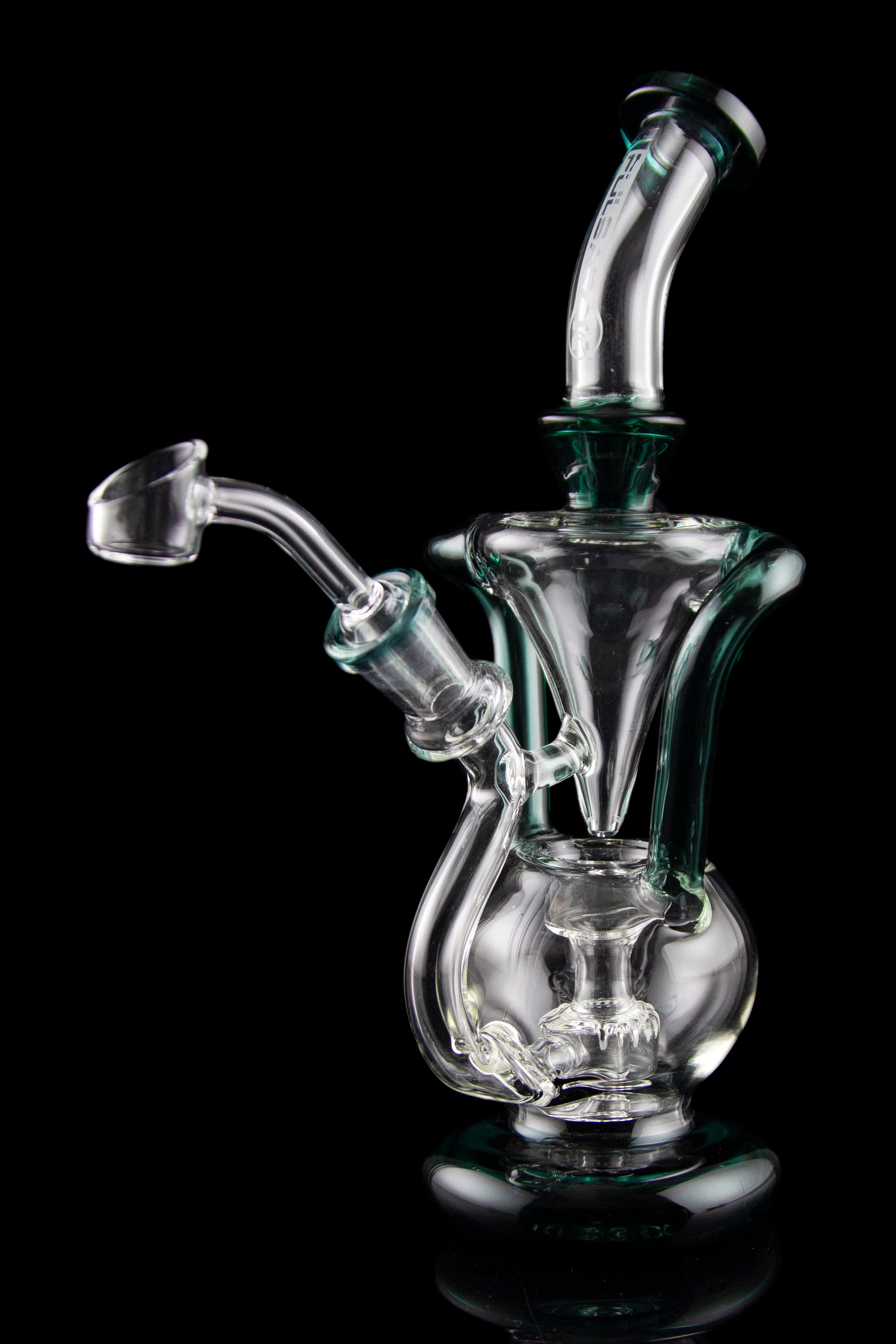 Clear glass dab rig with turquoise accents, featuring a complex perc system and quartz nail, isolated on black.