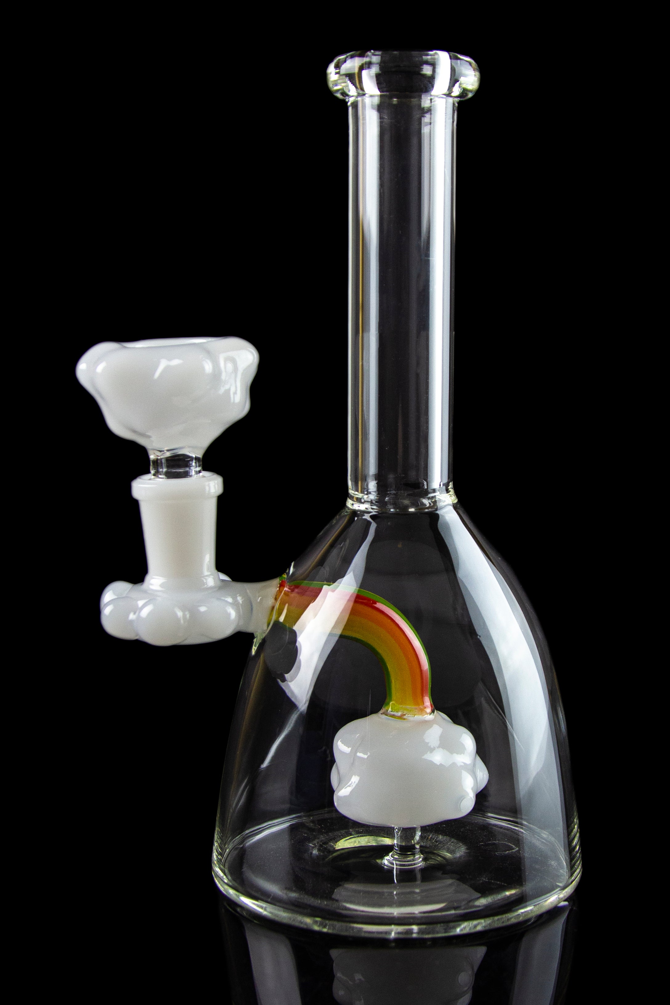 Clear glass water pipe (bong) with rainbow and cloud-shaped percolators, and separate glass bowl, isolated on black.