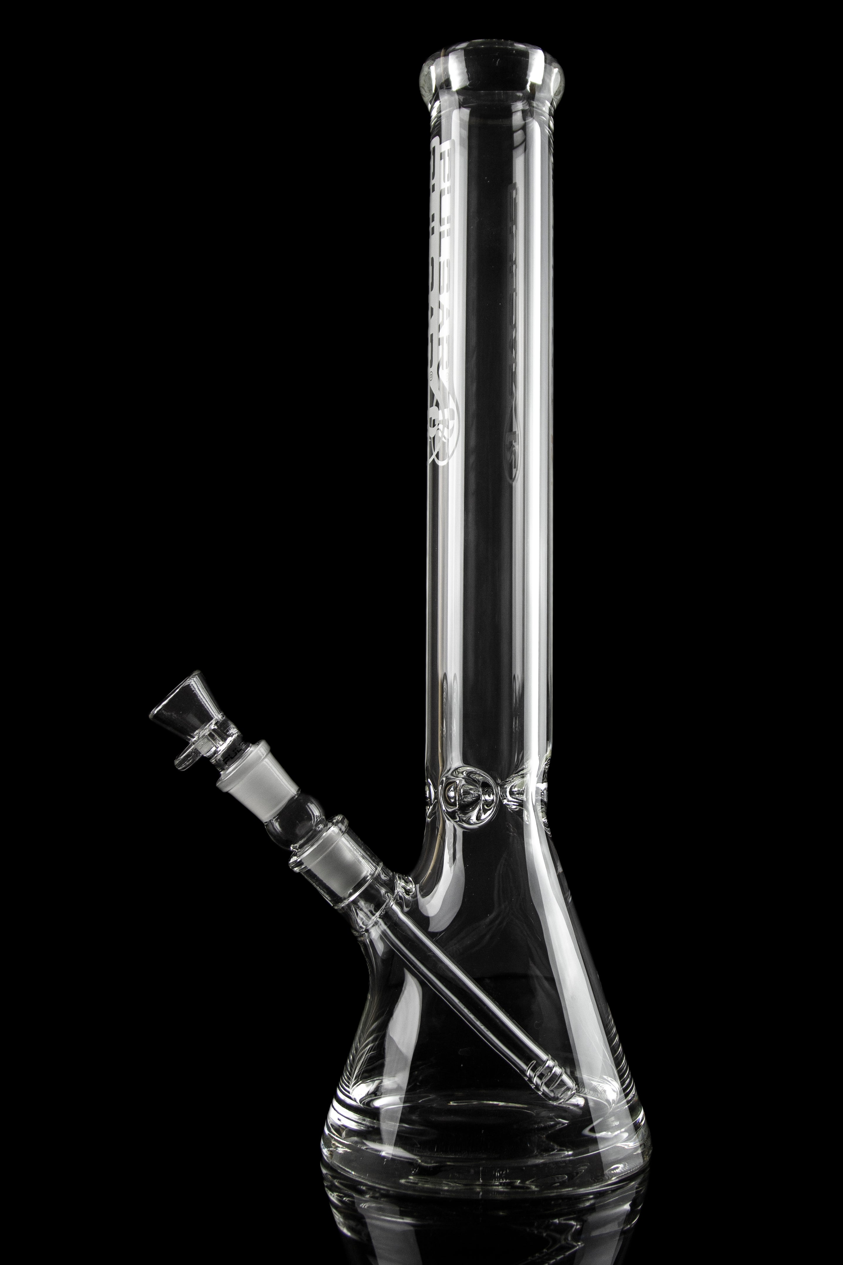 Clear glass bong with ice pinch and downstem against a black background.