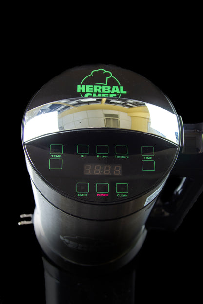 Close-up of a Herbal Chef infusion appliance control panel displaying digital timer settings.
