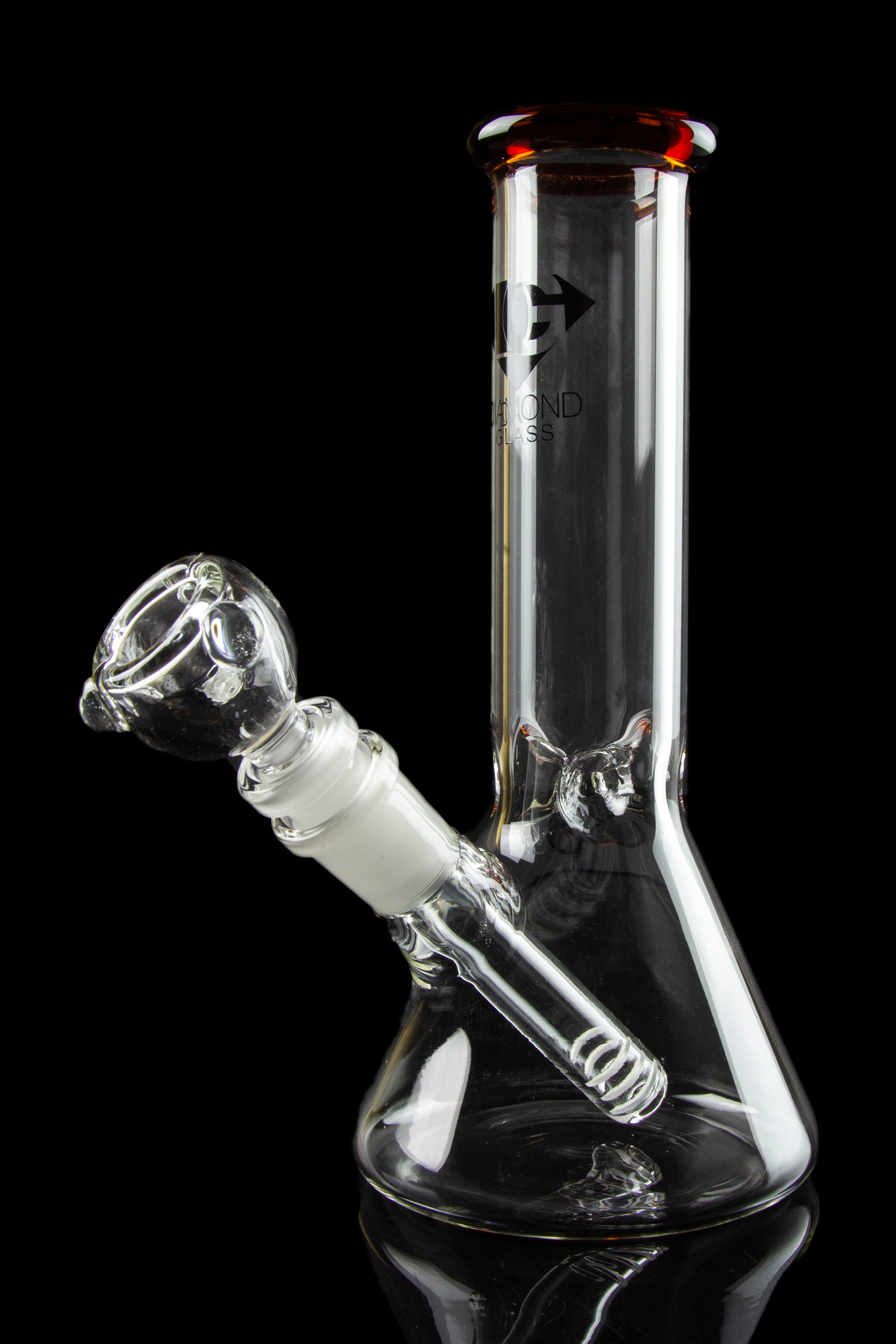 Front view of the Diamond Glass 8" Classic Beaker Bong, reflecting light on its clear glass surface against a dark background.