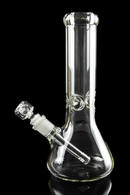Clear glass bong with ice catcher and downstem, isolated on black.