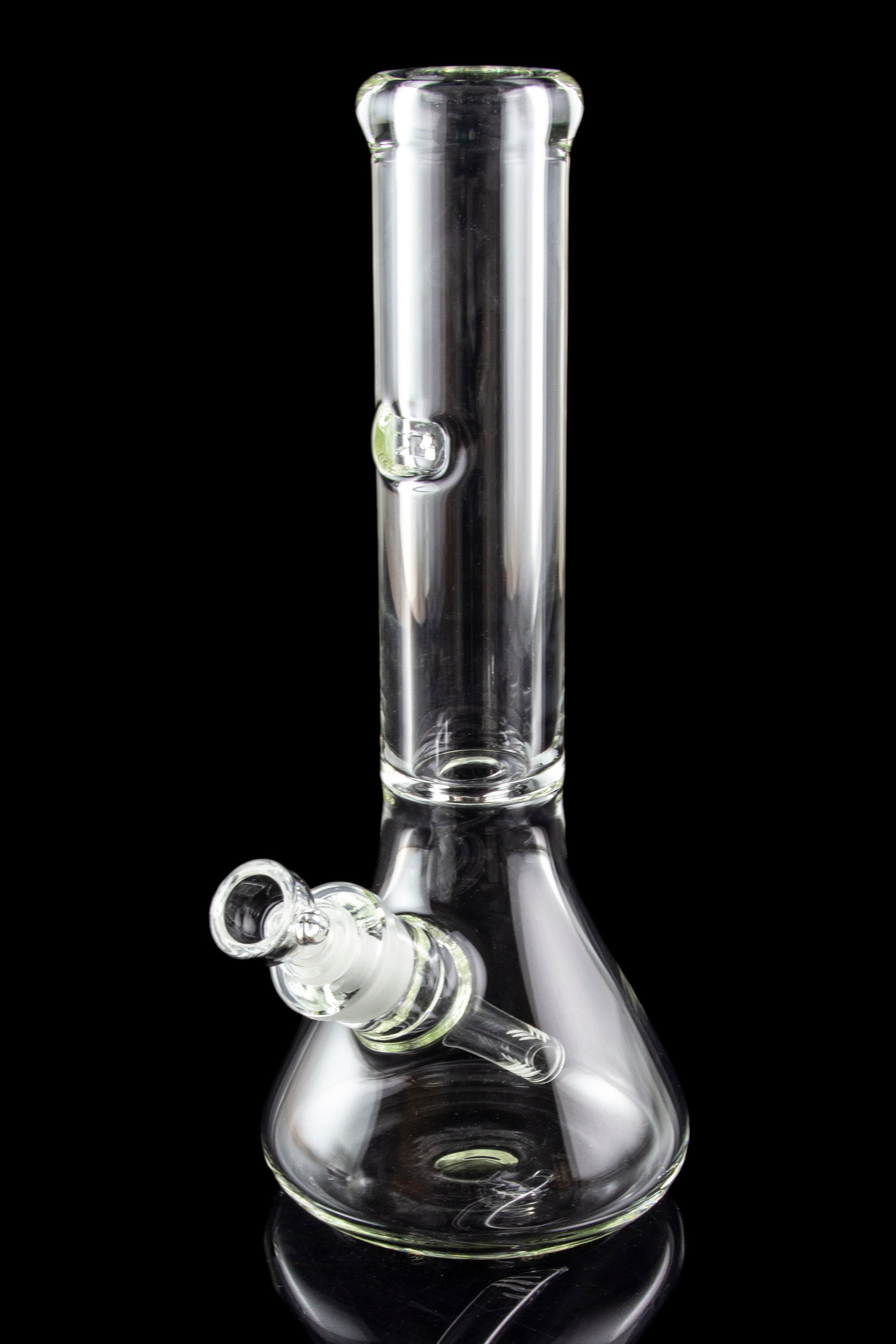 Clear glass bong with a flared base and ice catcher, isolated on black.