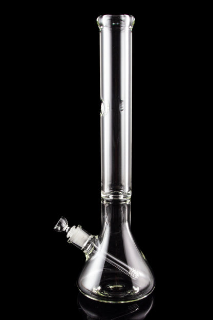 Clear glass bong with ice catch and downstem, isolated on black.