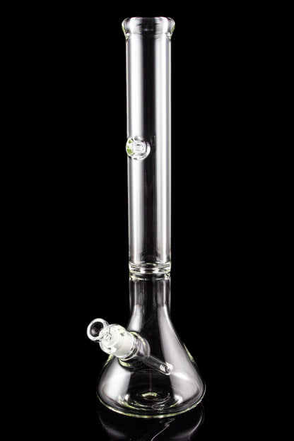 Clear glass bong with ice catch and diffuser downstem, isolated on black.