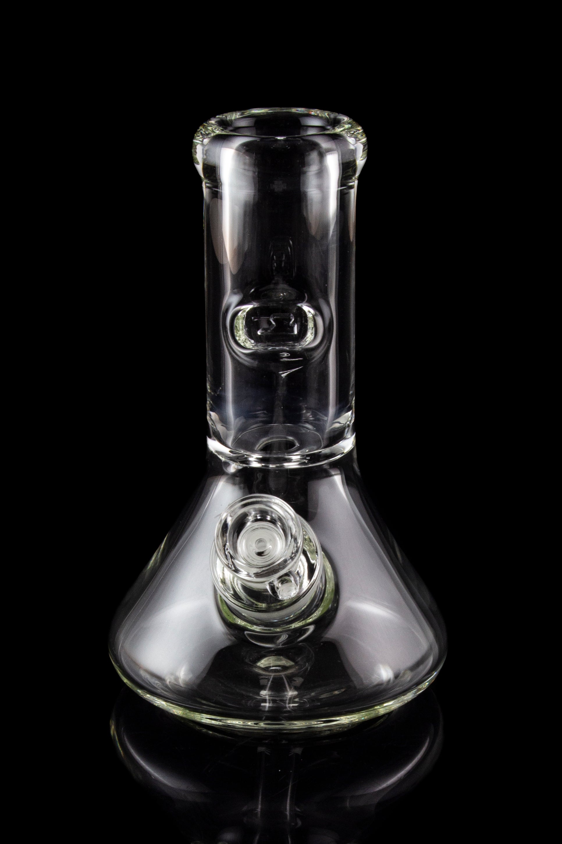 Clear glass bong with a flared base and bubble percolator, isolated on a black reflective surface.