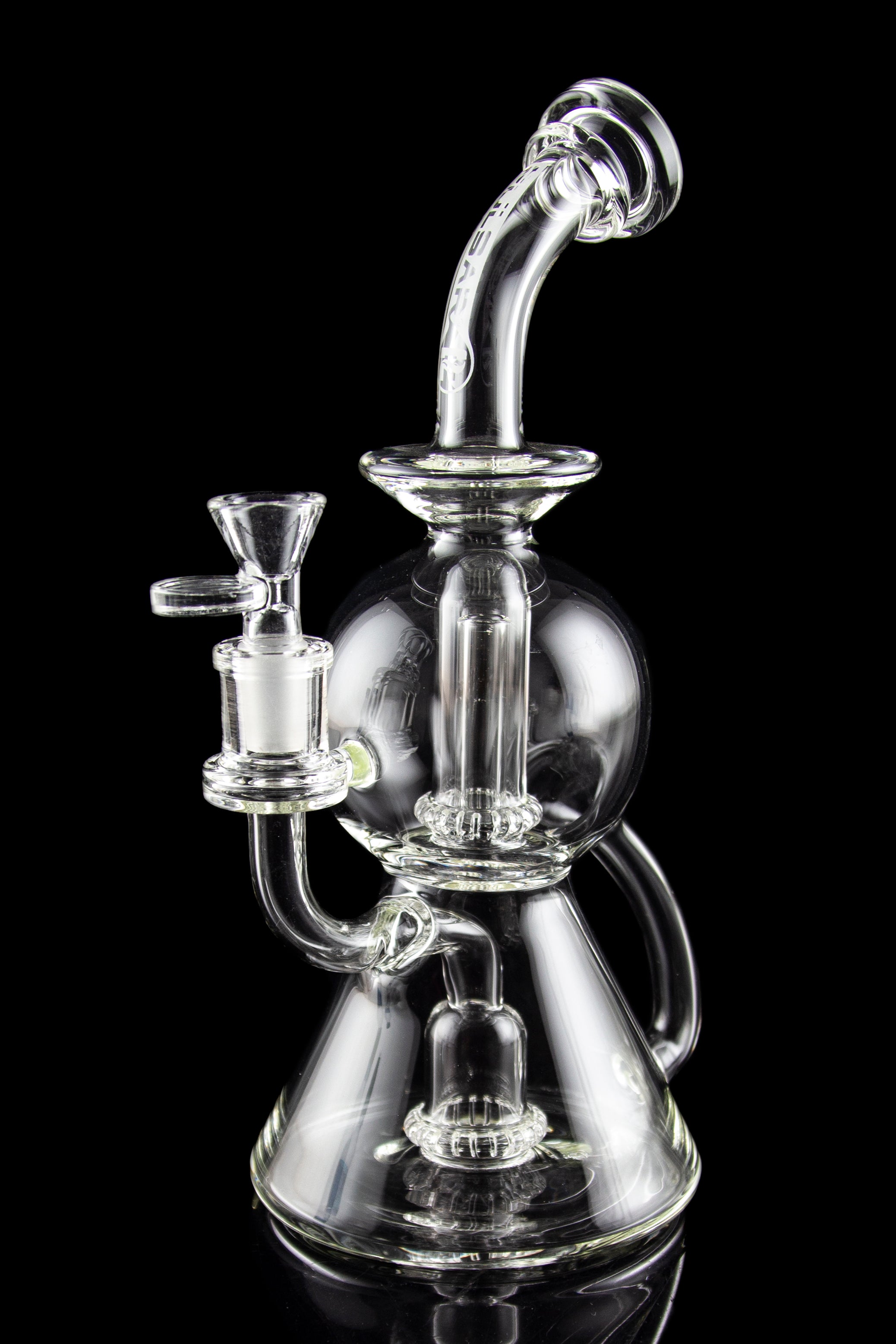 Clear glass water pipe (rig) with intricate bubbler design, isolated on black.