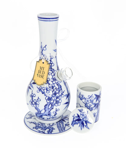 A detailed, angled view of the "My Bud Vase "Luck" Porcelain Vase Bong" featuring intricate floral designs on white porcelain.