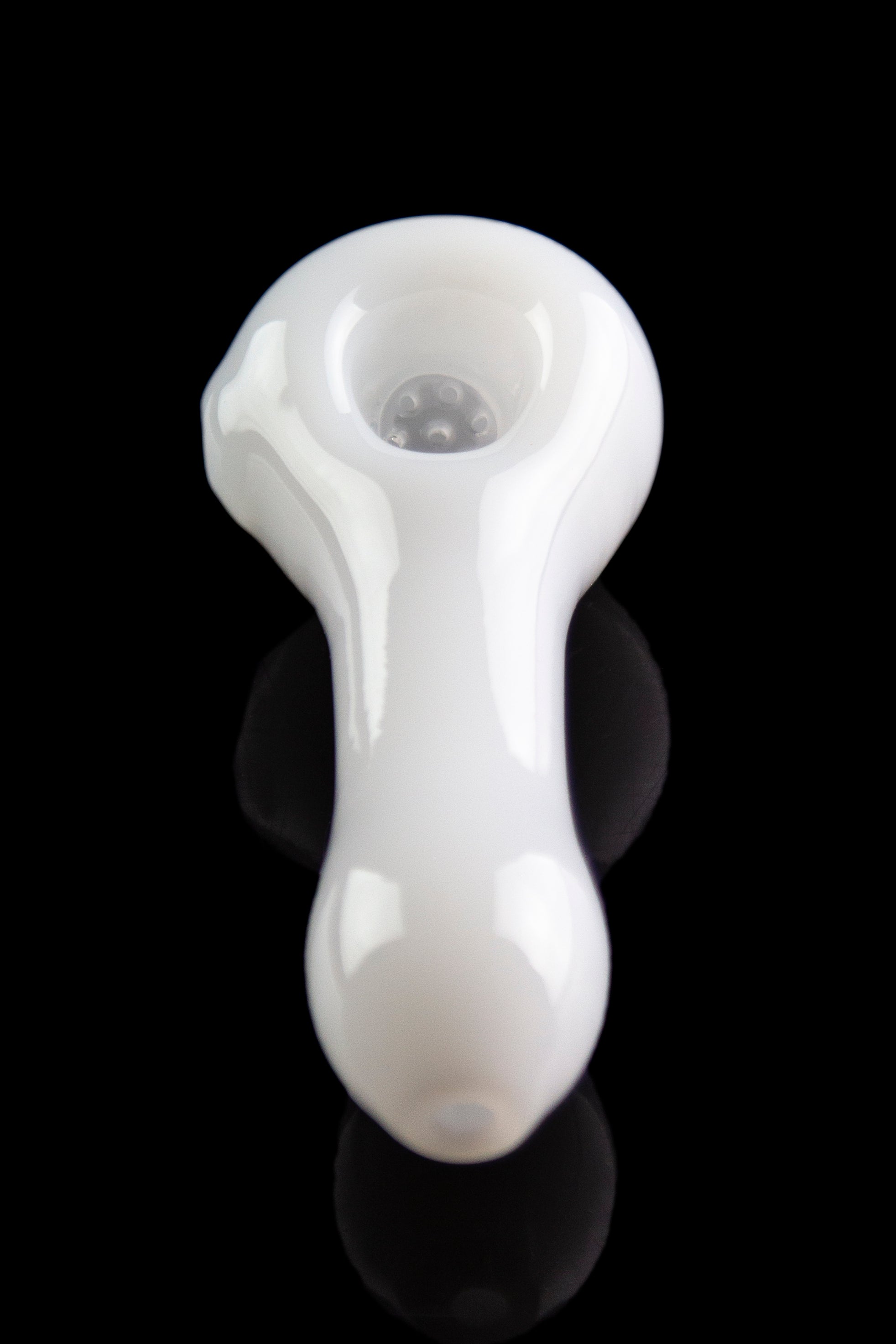 White glass pipe for smoking cannabis, studio shot.