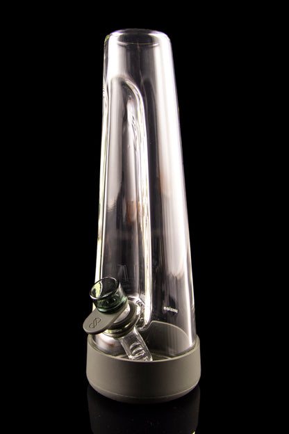Clear glass water pipe (rig) for cannabis concentrate use, with a green mouthpiece, isolated on a black background.