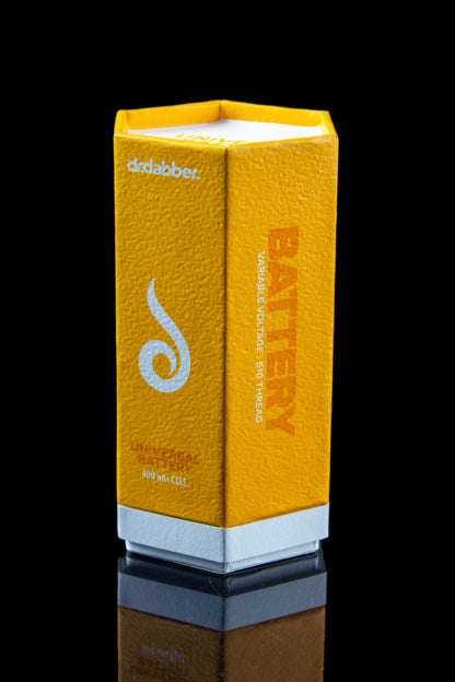 Orange Dr. Dabber battery with silver logo and text, reflecting on a dark surface.