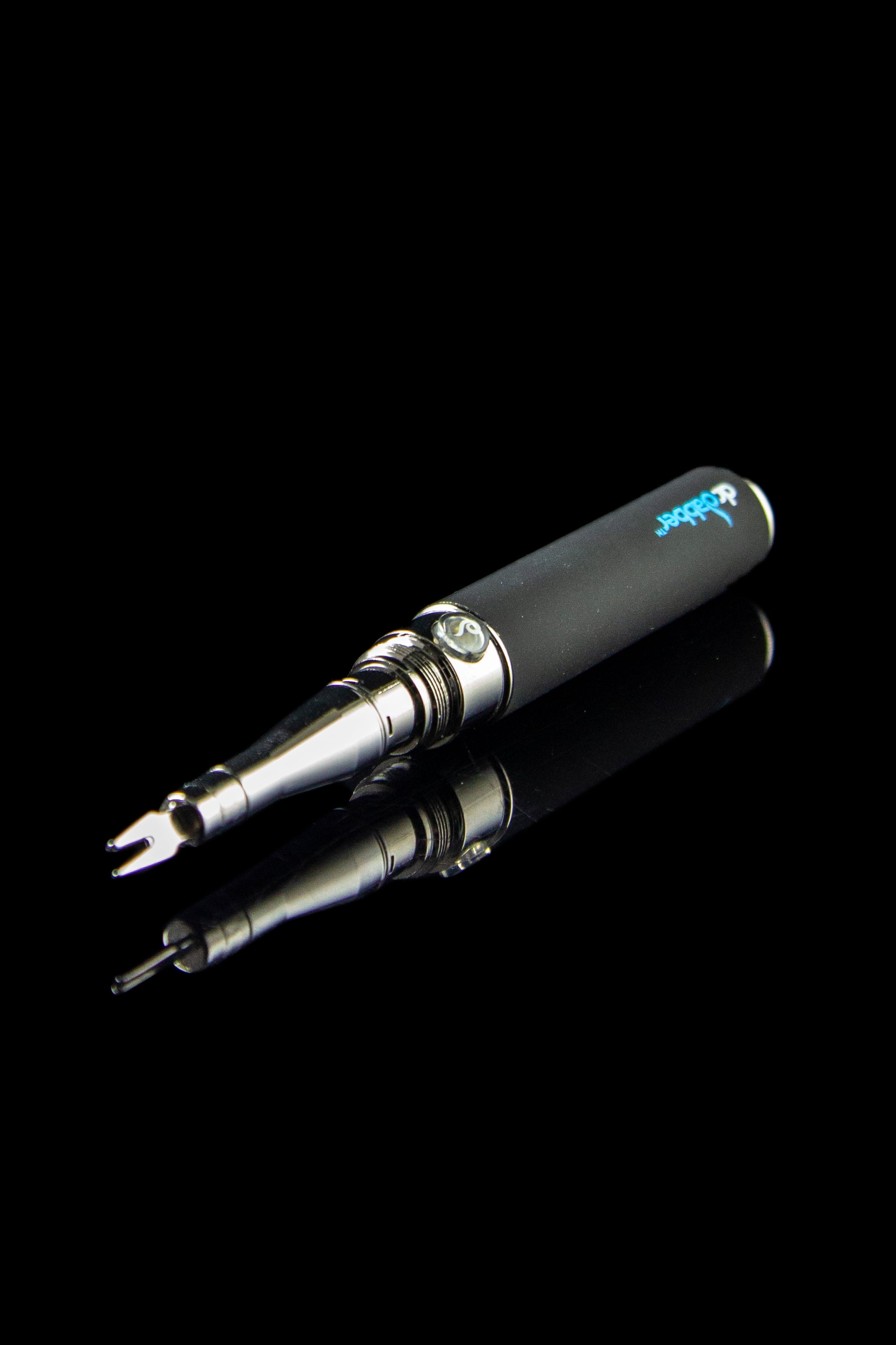 Close-up studio shot of the Dr. Dabber Budder Cutter, displaying its metallic finish and sleek, minimalist design against a black background.