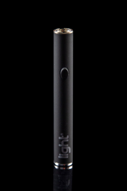 Black cannabis vape pen with “light” branding.