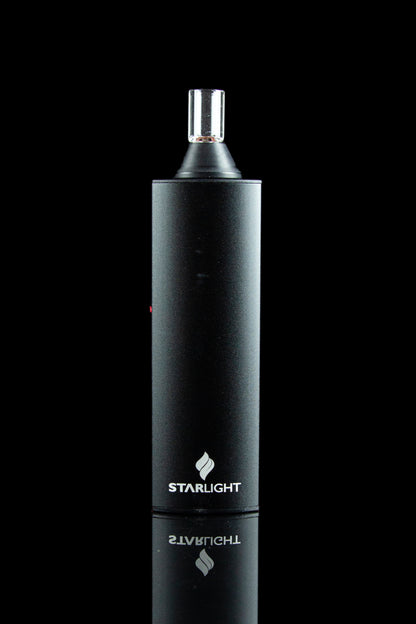 Black Starlight cannabis vaporizer pen with a glass mouthpiece.