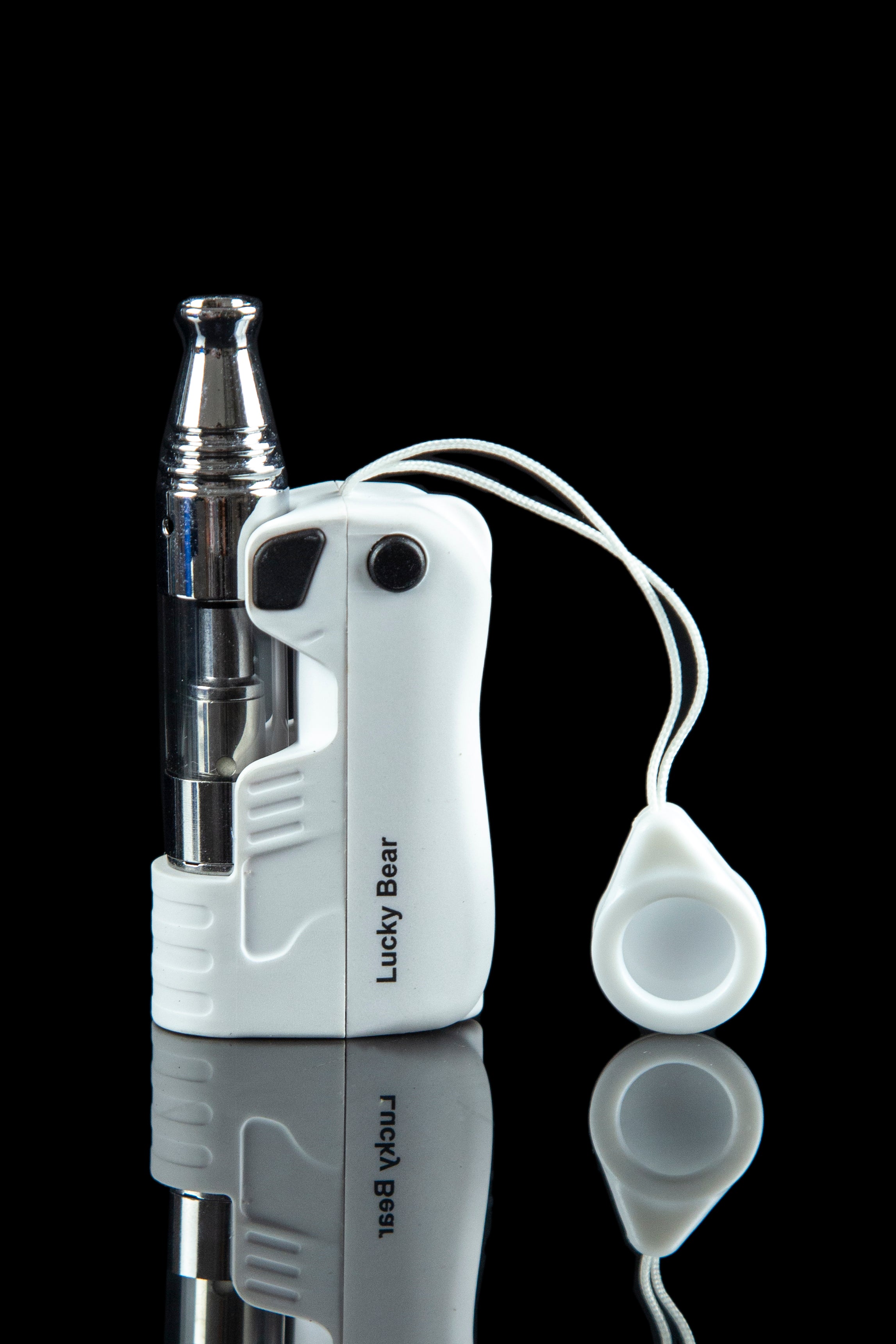 White cannabis oil vaporizer pen with glass cartridge and magnetic mouthpiece, reflected on a black surface.