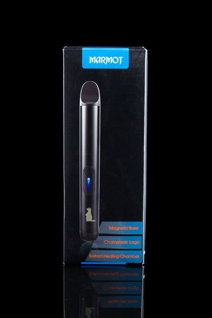 Black cannabis vaporizer pen in a branded box with product features listed.