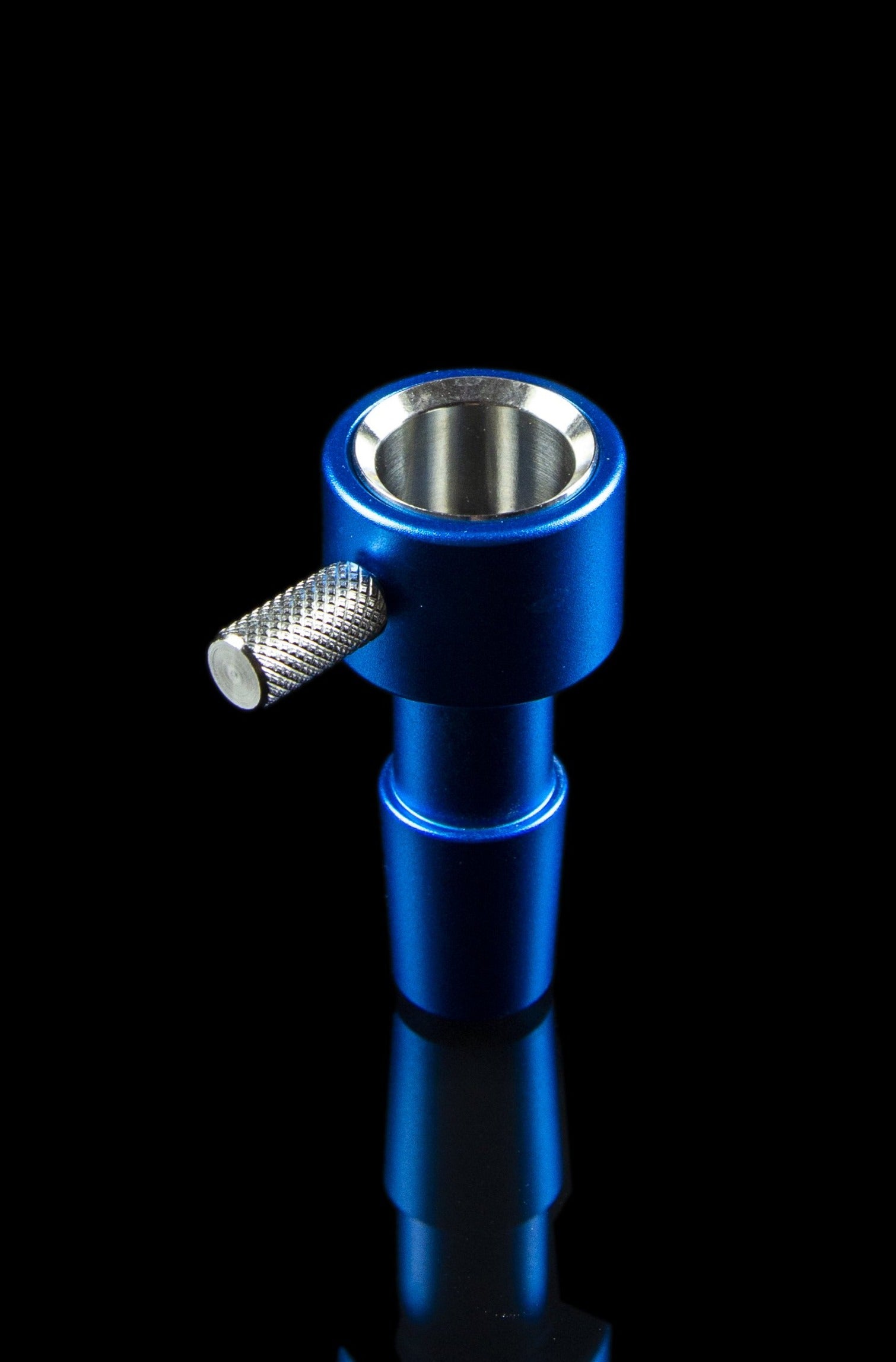 Blue metal pipe for smoking cannabis, isolated on a black background.