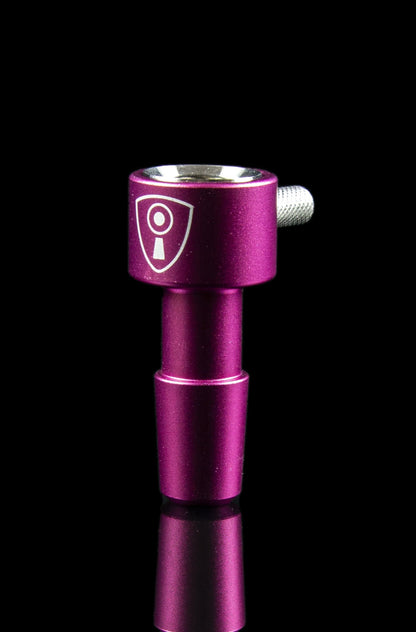 Purple titanium oil rig with a shield-shaped logo, reflecting on a dark surface.