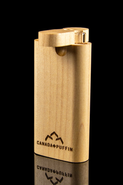 Wooden lighter with "Canada Puffin" logo and reflective surface.
