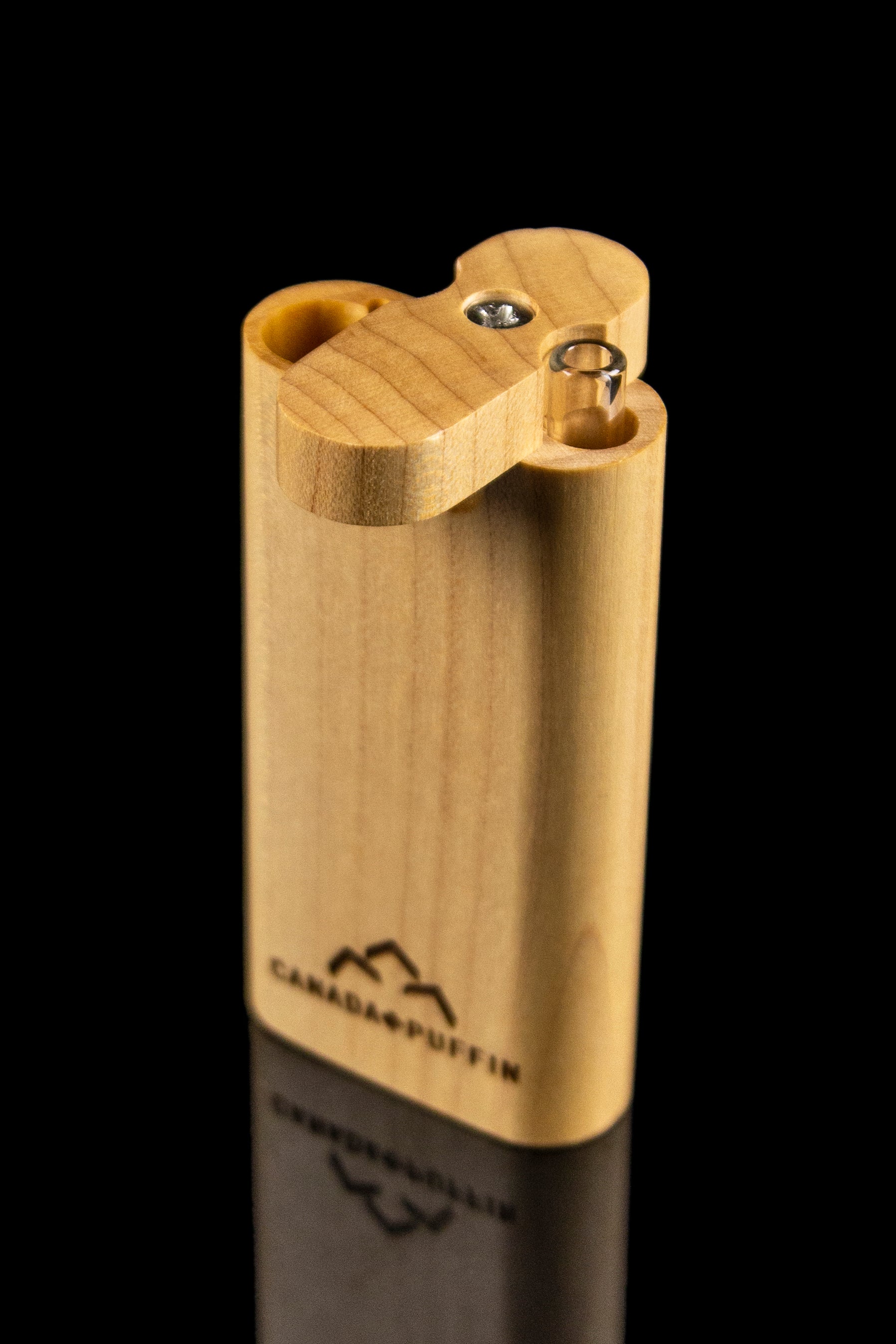 Wooden lighter with cannabis leaf logo and visible flint wheels.