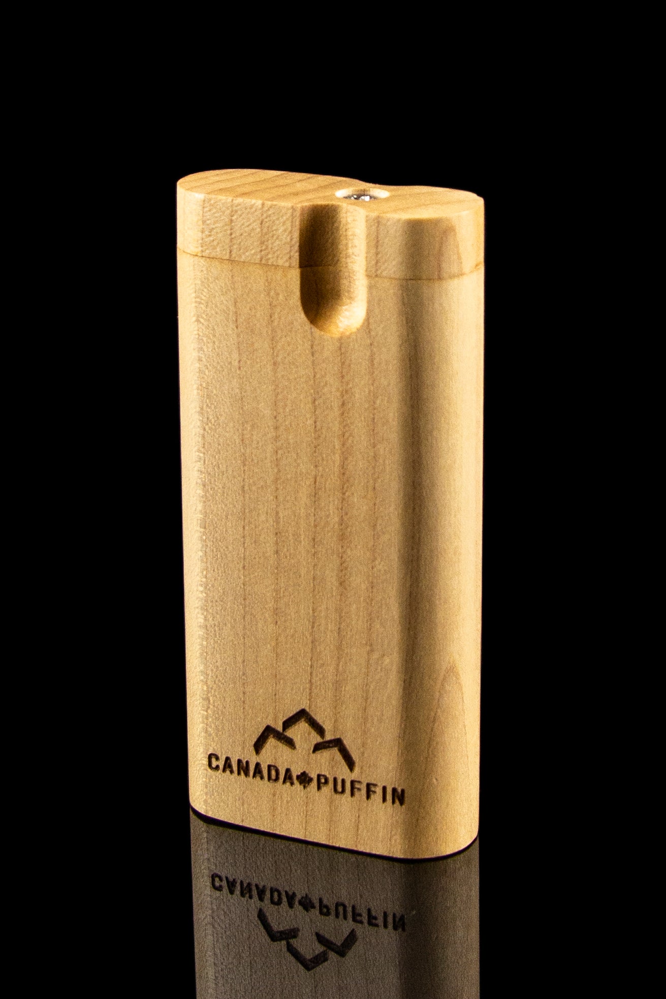 Wooden cannabis pipe with “Canada Puffin” logo and reflective surface.