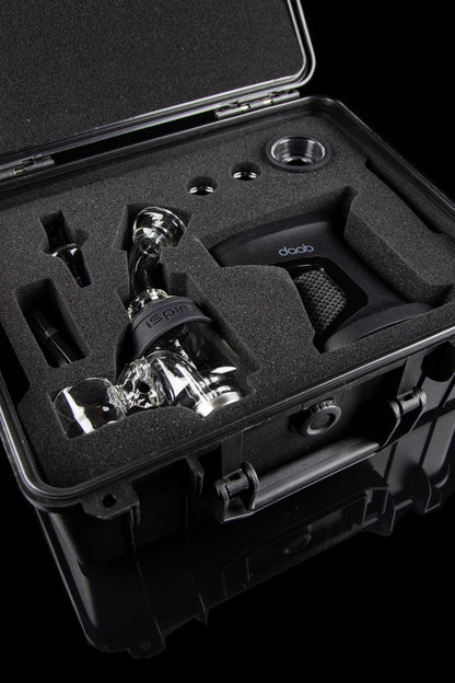 Dab rig and accessories nestled in a protective, foam-lined carrying case.