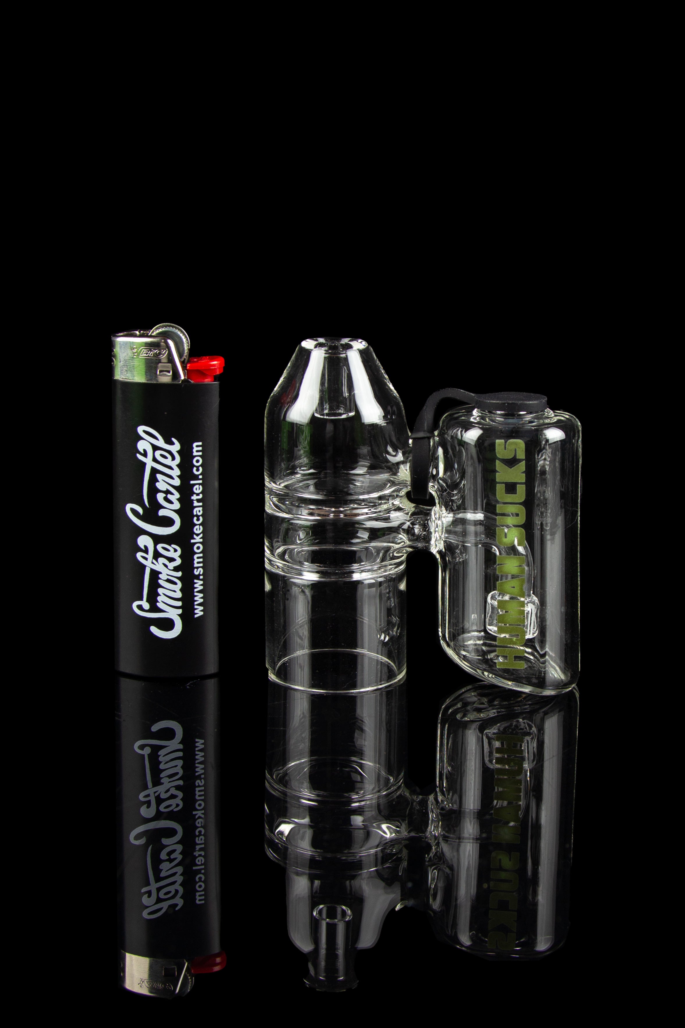 Glass bubbler water pipe and branded lighter against a dark background.