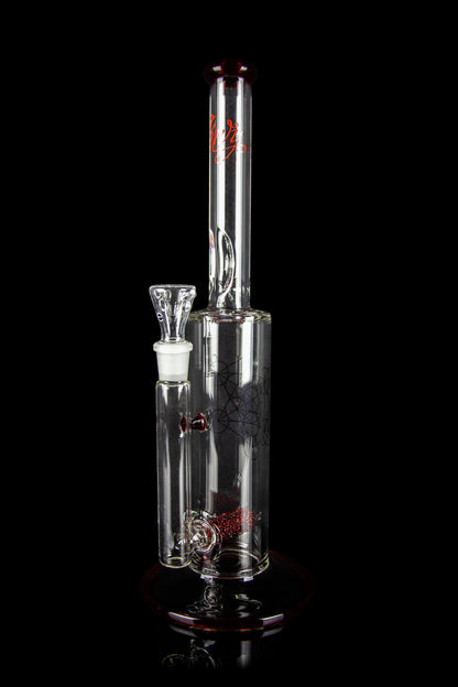 Clear glass water pipe (bong) with red accents and intricate geometric patterns, isolated on a black background.