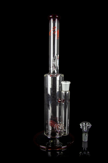 Clear glass water pipe (bong) with red accents and a glass bowl, isolated on a black background.