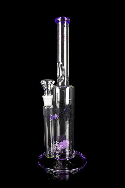 A clear glass water pipe (bong) with purple accents and intricate internal percolators, isolated on a black background.