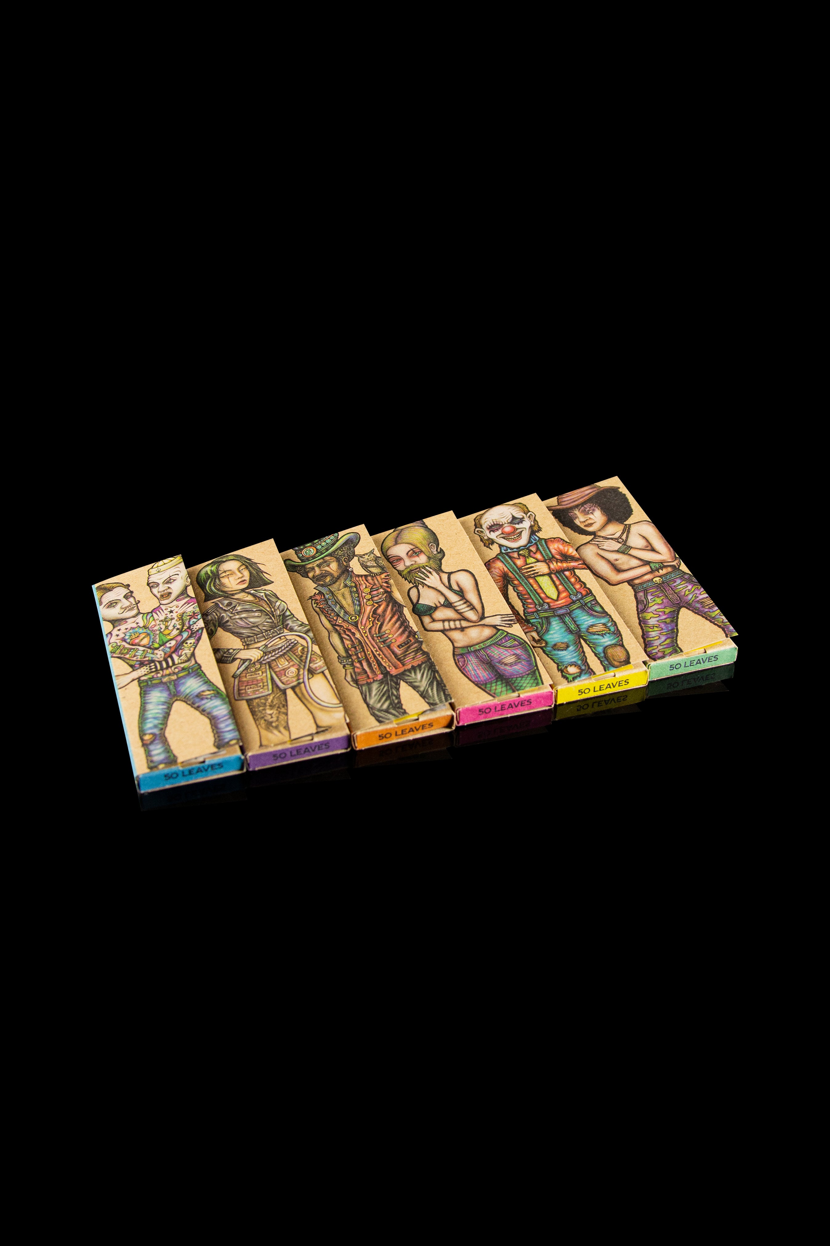 A studio shot of six colorful, illustrated rolling paper booklets labeled "So Leaves" against a black background. Each booklet features a unique character portrait.