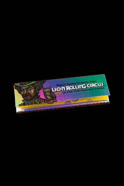 Pack of Lion Rolling Circus ultra-thin rolling papers with a regal lion portrait on black background.