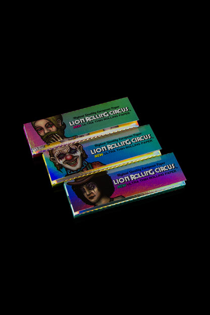 Three packs of “Lion Rolling Circus” rolling papers featuring circus clown imagery against a dark background.