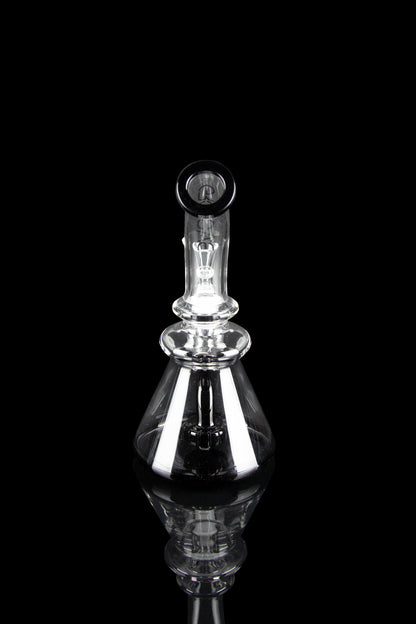 Clear glass dab rig with intricate detailing, isolated on black.