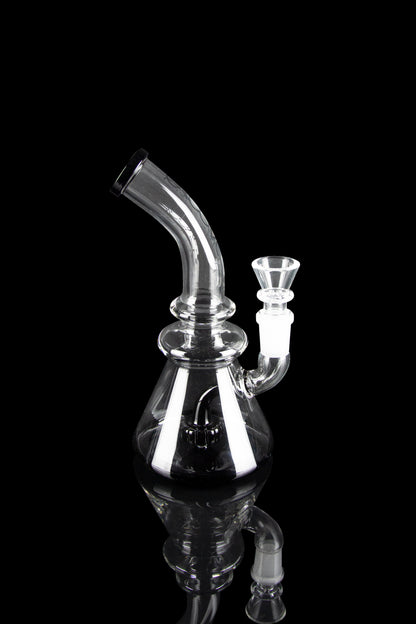 Clear glass water pipe (bong) with a glass bowl, isolated on a black background.