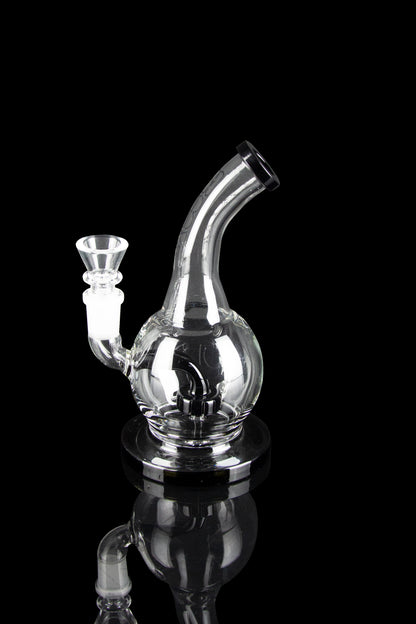 Clear glass water pipe (rig) with intricate bubbler design, isolated on black.