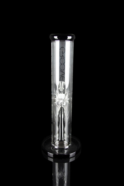 Clear glass water pipe (bong) with intricate design, studio shot on black.
