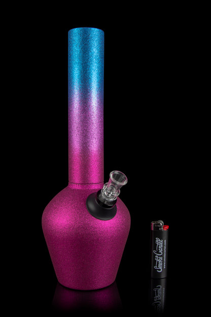 A vibrant, color-shifting glass bong with a clear mouthpiece, displayed alongside a black lighter with branding.