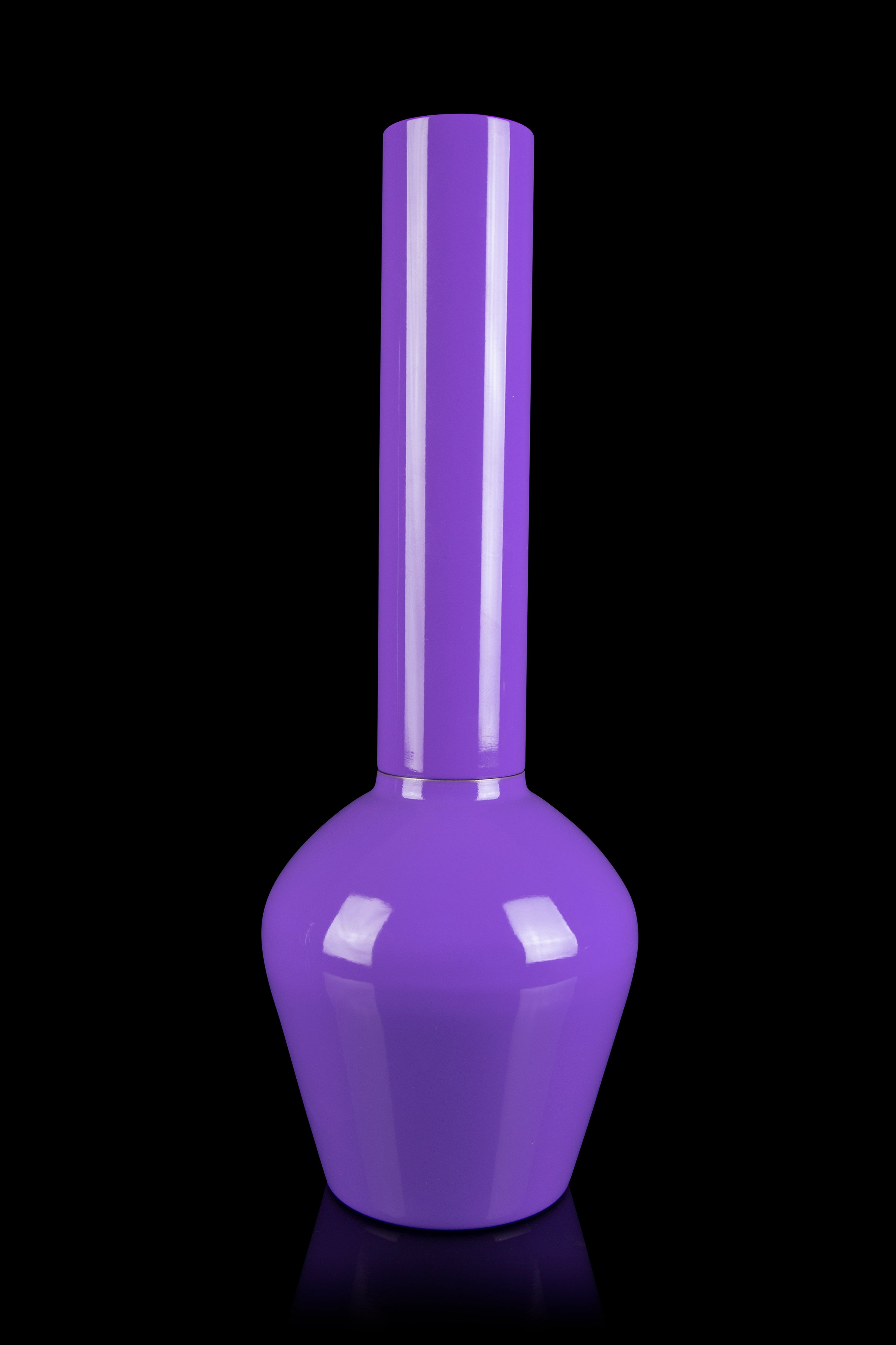 Purple glass bong with vertical stripes, isolated on black.