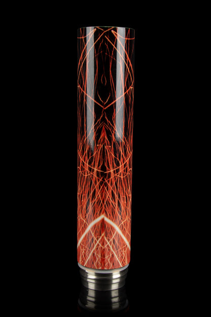 Red and white patterned glass bubbler with a silver base, isolated on a black background.