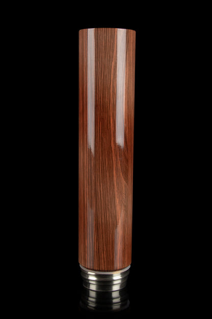 Wooden bubbler stem isolated on a black background.