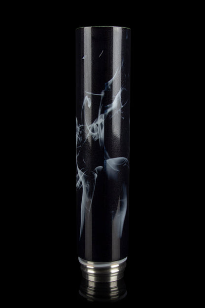 Black glass bong with swirling white smoke pattern, isolated on a black background.
