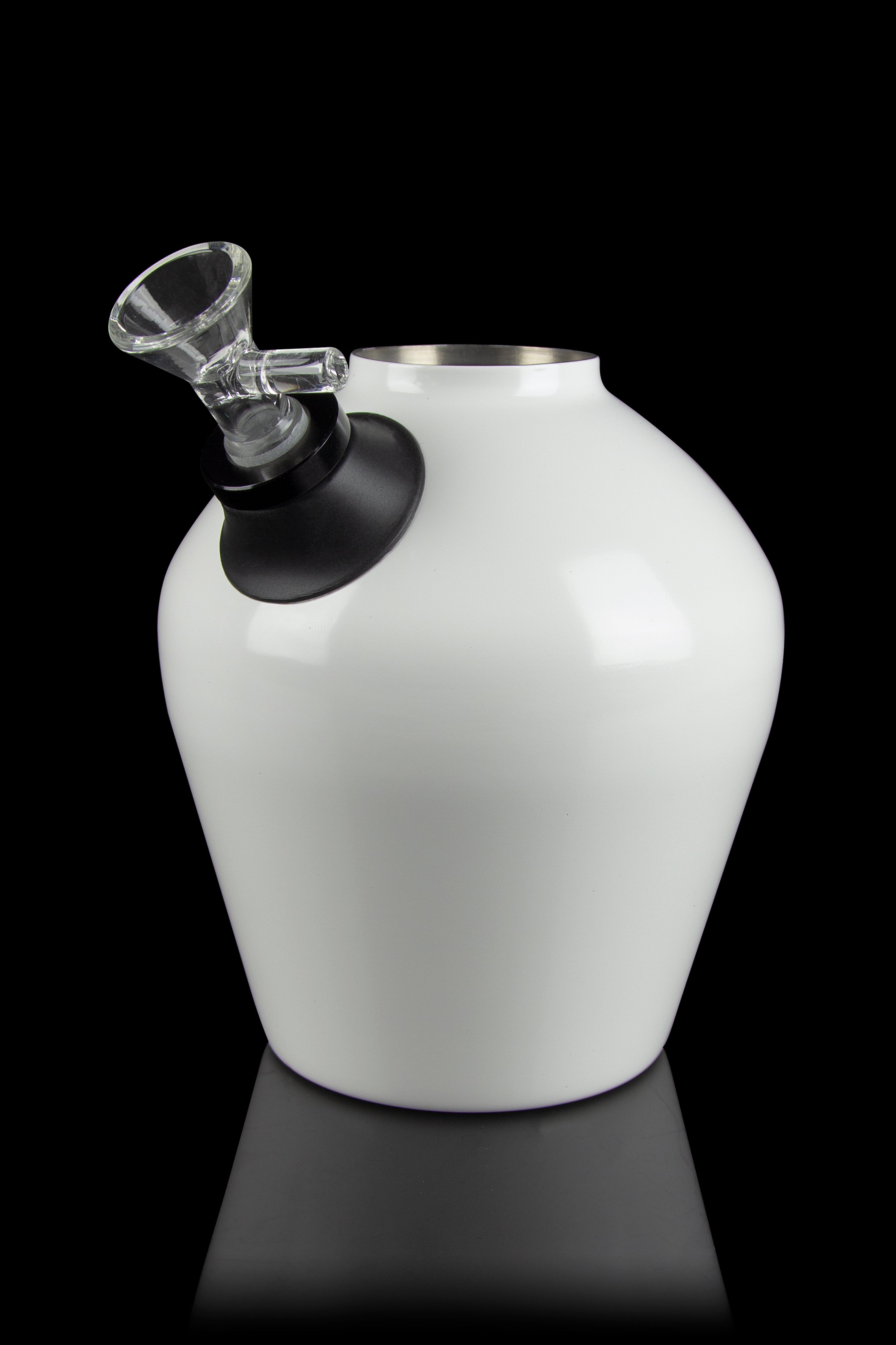 White ceramic water pipe with glass mouthpiece, studio shot.