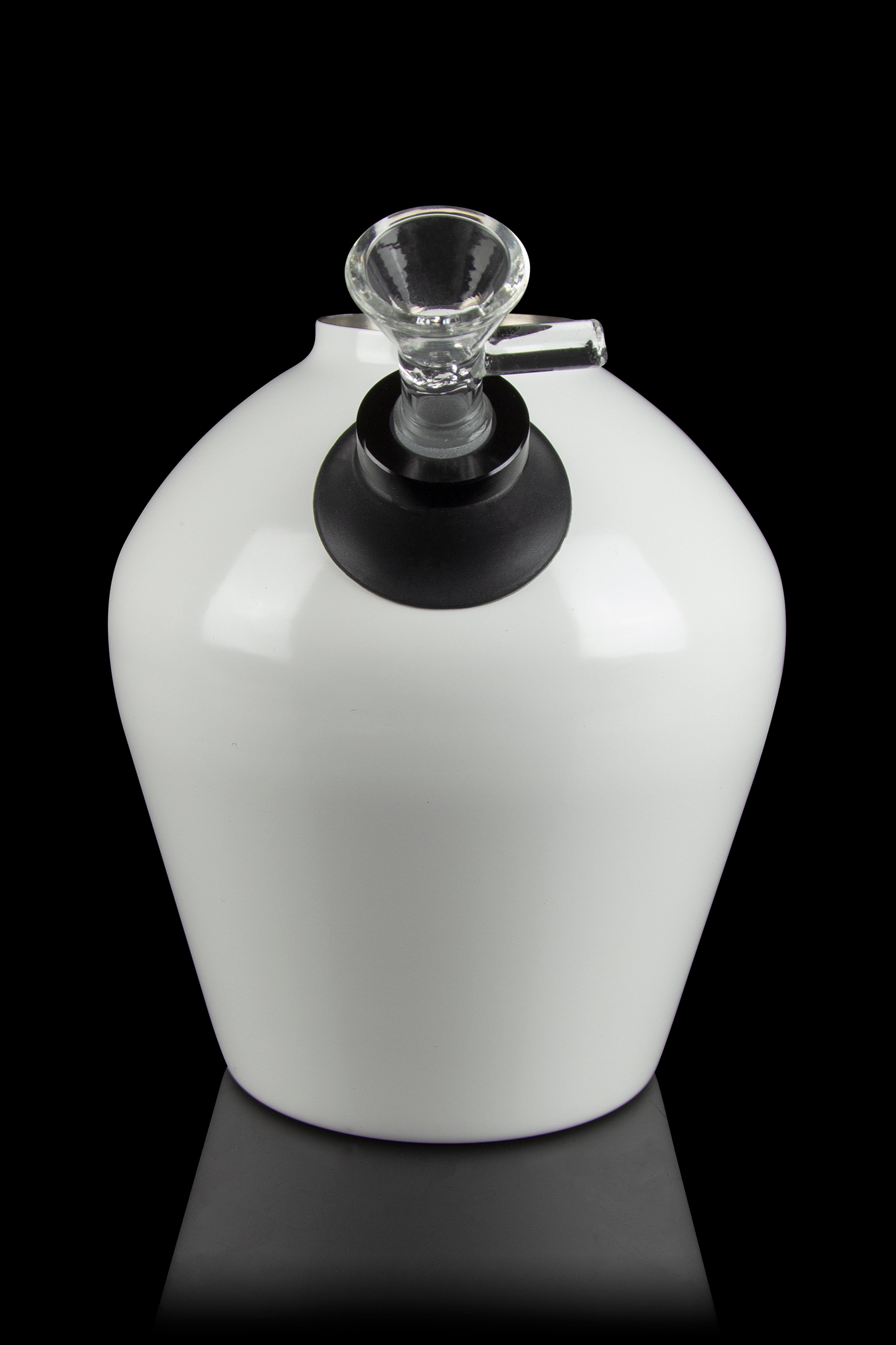 White glass water pipe with a clear mouthpiece and black accent ring, studio shot on a reflective surface.