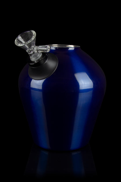 Blue glass water pipe with a clear mouthpiece against a black background.
