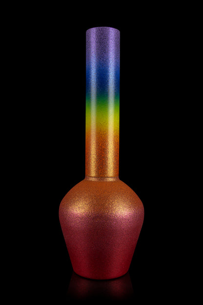 Rainbow-colored glass water pipe against a black background.
