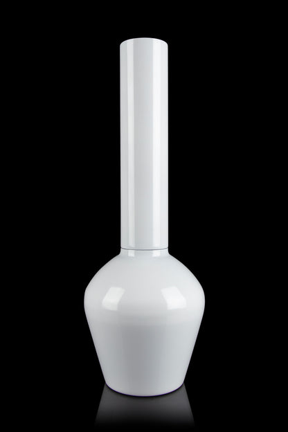 White glass bong isolated on a black background.