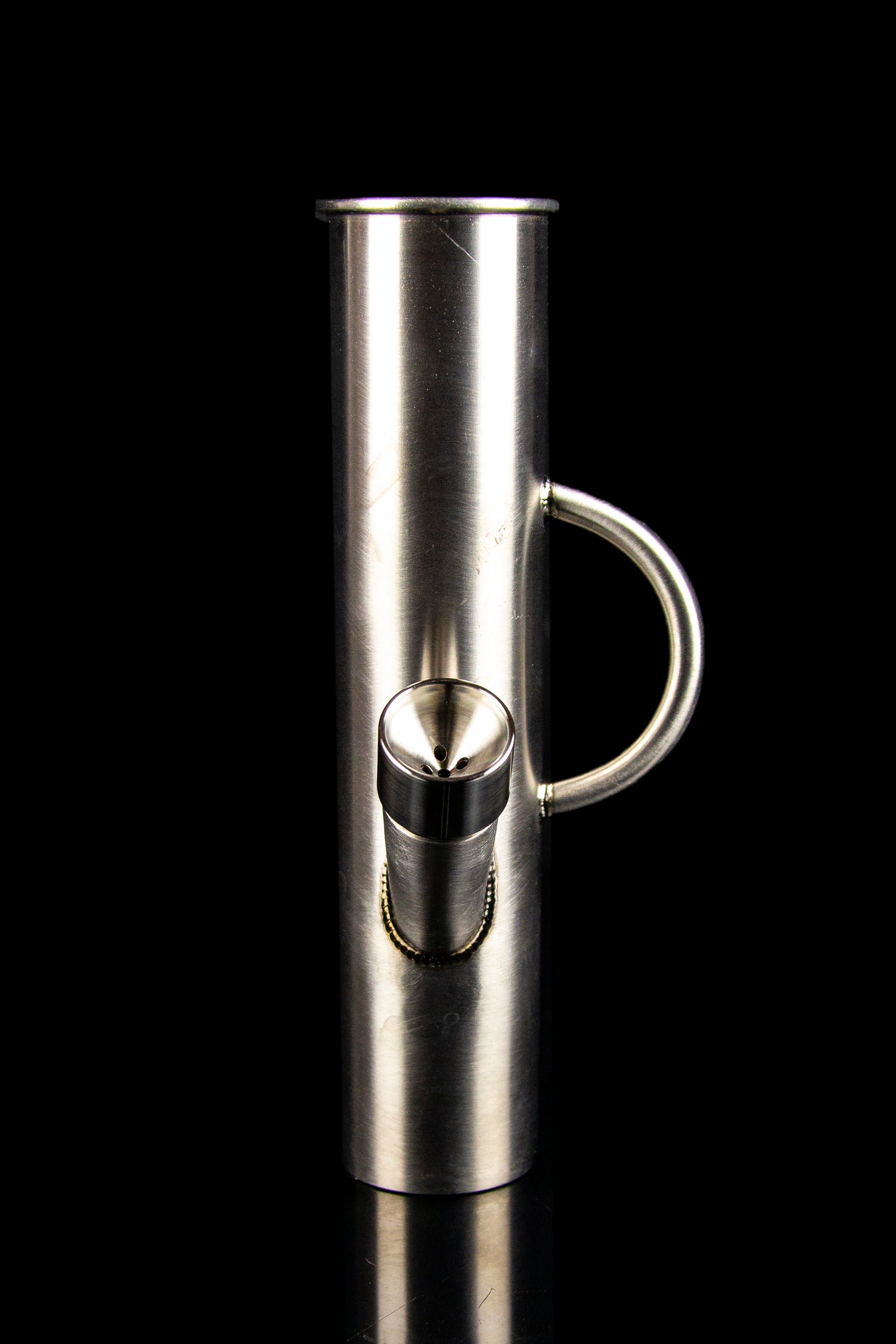 Stainless steel oil burner pipe with a glass bowl, isolated on black.