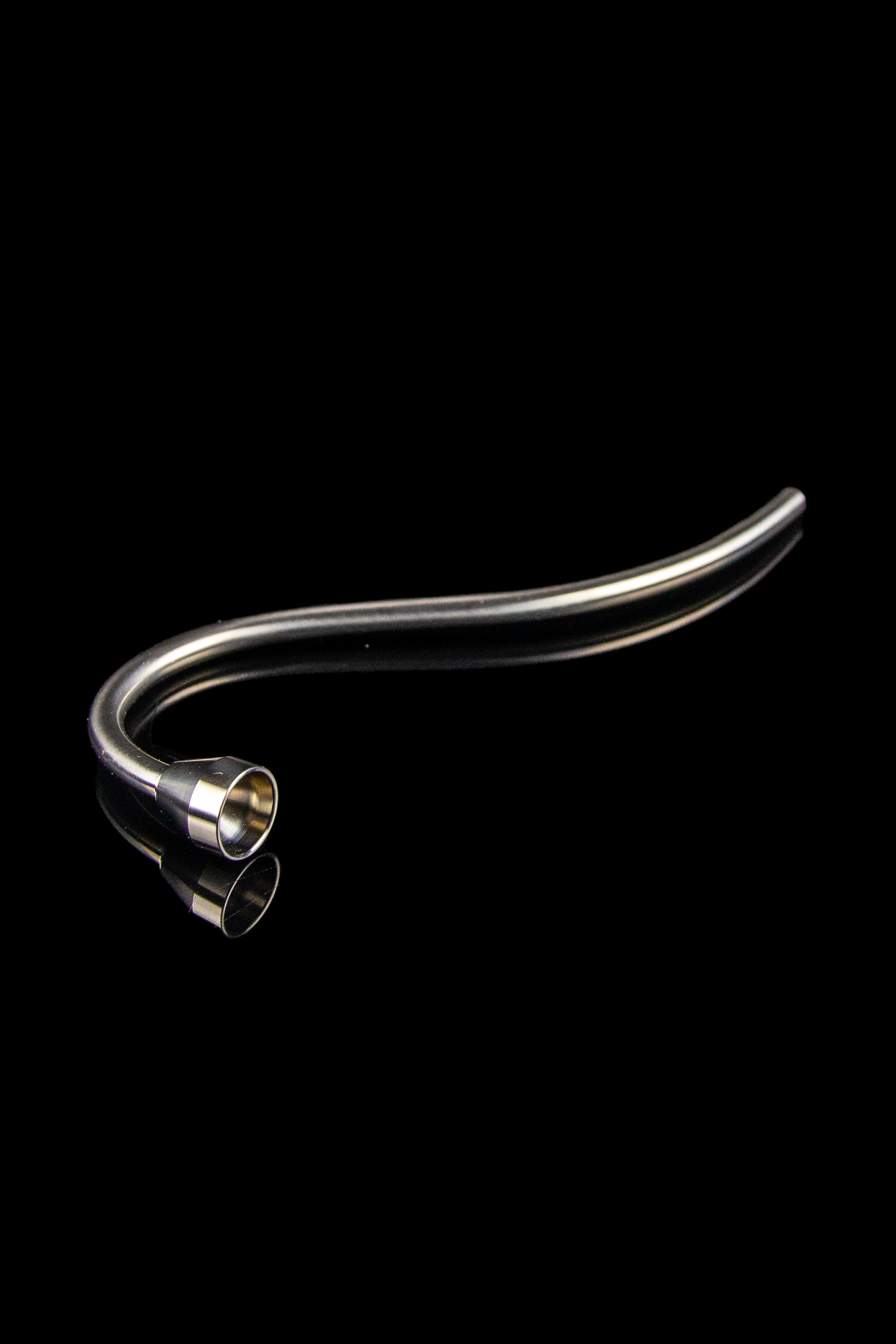 Glass cannabis oil rig bubbler attachment with metal mouthpiece.